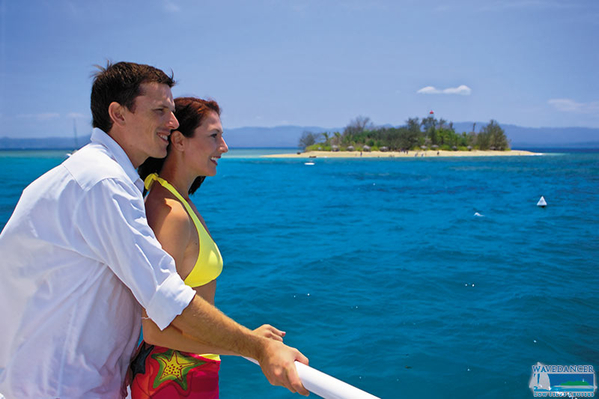 couple-on-boat-low-isles-in-background.jpg
